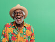 © Journey 41 - Smiling black senior man, isolated green color background, image with space for text
