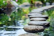 © SaroStock - stack of rocks sitting in river, Showcase the beauty of therapy with serene image of river flowing smoothly, removing the pebbles representing obstacles