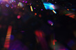 © Aleksandra Konoplya - Iridescent prism light effect on black background, rainbow of colors on the black background. Glowing colorful lights and a bokeh lens flare with space, abstract refraction of sunlight prism effect