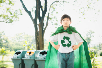 Cheerful young superhero boy with cape and recycle symbol promoting waste recycle, reduce, and reuse encouragement as beacon of eco sustainable awareness for future generation. Gyre