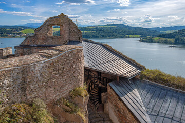 Aerial view of the ruins of Czorsztyn Castle and Czorsztyn Lake in Poland, Europe