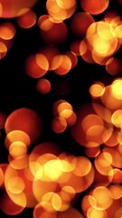 Wall Mural - abstract bokeh golden particles. seamless loop of abstract background made of bokeh circles and part