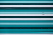 © DeShaun Craddock - Green and teal horizontal stripe pattern