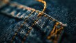 © Shozib - Close-up of blue denim jeans with intricate yellow stitching details, highlighting fine craftsmanship and fashion essence. Explore fabric texture and material for backgrounds or abstract designs
