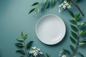 A simple still life scene featuring a white plate sitting on top of a green table