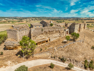 Wall Mural - Aerial view of Huerta de la Obispalia in La Mancha Spain, hilltop medieval fortification with pentagonal bastion gun platforms at both ends