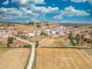 Sticker - Aerial view of Huerta de la Obispalia in La Mancha Spain, hilltop medieval fortification with pentagonal bastion gun platforms at both ends