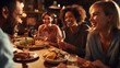 © Prapan - Group of diverse friends laughing and enjoying a delicious meal together at a cozy restaurant