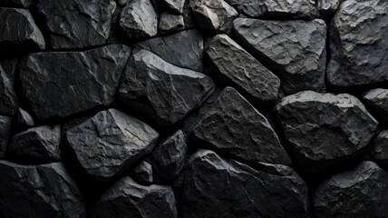 Black textured rock wallpaper with light reflections 