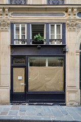 Wall Mural - fancy and stylish vintage shop facade , black painted french boutique storefront