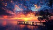 © Abdul - A peaceful lakeside scene with a wooden pier extending into the water, silhouetted by a vibrant sunset sky.