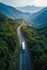 Wall Mural - A truck drives down a mountain road with scenic views