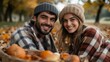 © Pavel Kachanau - A couple shares a joyful picnic in vibrant autumn foliage while smiling warmly