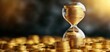 © Thanapipat - Hourglass filled with gold coins, representing the passage of time and the benefits of long-term investing, wealth strategy
