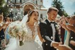 © Gatherina - Newlyweds leaving church with guests throwing flower petals