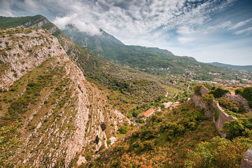 Wall Mural - Ancient fortress ruins in Bar, Montenegro, perched on rugged mountains.