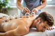 © Man888 - Close-up of a wellness cupping massage therapy session, focusing on the treatment of an athletic individual's back, promoting relaxation and rehabilitation in a medical clinic setting.
