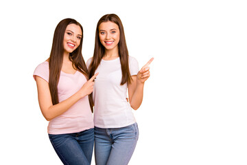 Sticker - Close up photo two people beautiful she her ladies models best buddies hand arm fingers indicate direct empty space cool offer black friday wear white pink casual t-shirts isolated yellow background