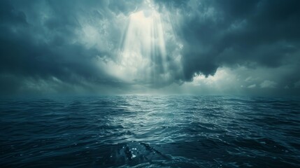 Dramatic ocean view under cloudy skies with rays of sunlight breaking through at dusk