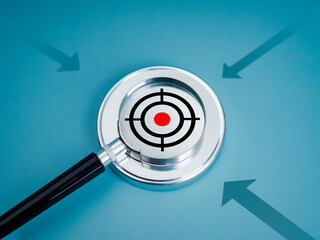 Wall Mural - Business goal and success, market trend research, aiming point center concept. Shooting target icon focused in magnifying glass lens on round chrome badge with attacking arrows on blue background.