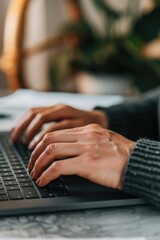 Sticker - A close-up view of someone typing away on their laptop