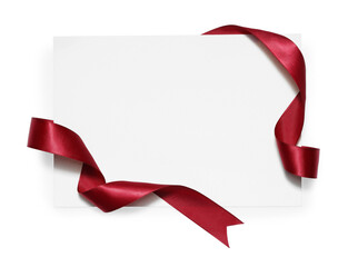 Poster - Red satin ribbon and blank card isolated on white, top view