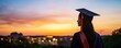 © DigitalMagicVisions - Dreaming Beyond: Profile Silhouette of University Graduate in Cap Gazing at Future Aspirations on Campus at Sunset with Copy Space
