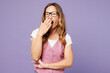 © ViDi Studio - Young sad tired weary exhausted employee business woman corporate lawyer she wear white t-shirt vest glasses cover mouth with hand yawn isolated on plain purple background. Achievement career concept.