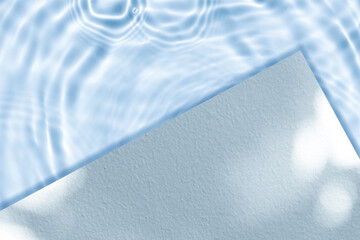 Wall Mural - summer background for product display on blue water texture with sunlight reflection on poolside, wh