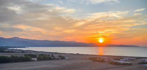 Wall Mural - view of a beautiful sunset at the mediterranean sea island of Cyprus