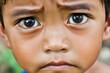 © Viam - Close-up portrait of young boy with expressive eyes