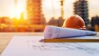© suratin - Construction Blueprint with Hard Hat and Ruler.