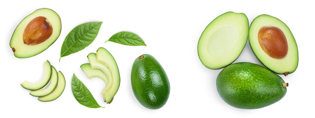 Poster - avocado and slices decorated with green leaves isolated on white background. Top view. Flat lay