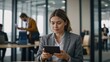 © LIFE LINE - Professional, woman and tablet with mobile phone at a company is typing a conversation on the internet. Female person, business and communication with tech for entrepreneurship at the office