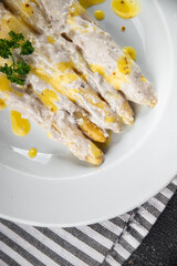 Wall Mural - white asparagus in cream sauce fresh meal food snack on the table copy space food background rustic top view