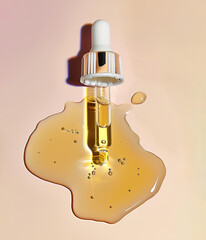 Wall Mural - Close-up of oily facial serum with dropper