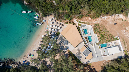 Poster - View from above, stunning aerial view of a bay with sandy beach on a turquoise, clear water. Syvota, Greece.