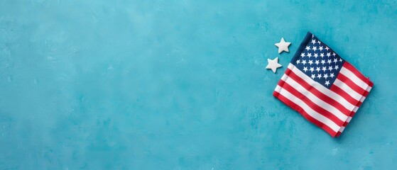  A red, white, and blue American flag on a blue background A solitary star graces the left side