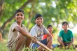 © James - Group of boys sitting in the park with cricket bat, Generative AI