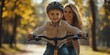 © MG - Little boy learning to ride bicycle at park with mother, Generative AI
