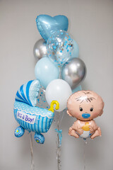 Wall Mural - blue balloons for discharge from maternity hospital, blue stroller, baby balloon figure