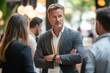 © nupam - Professional colleagues engaging in a discussion at a business expo event, Generative AI