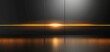 © hfwstudio - Abstract black background with golden glow and reflection.