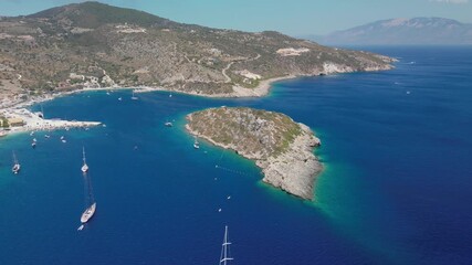 Wall Mural - The drone aerial footage of Agios Nikolaos island, Agios Nikolaos Harbour and beach, Zakynthos, Greece.	