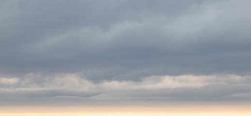 Sky replacement rolling gray and white dramatic storm clouds over horizon 2