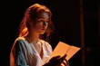 © Vlad - Actress on Stage: Young Beautiful Actress Reading Play Script in Theatre Performance