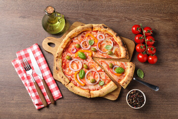 Canvas Print - Delicious vegetarian pizza served on wooden table, flat lay