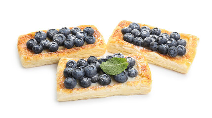 Wall Mural - Tasty puff pastries with blueberries isolated on white