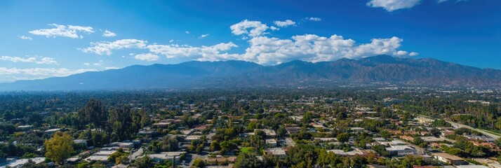 Wall Mural - Arcadia California. Aerial View of San Gabriel Mountains with Los Angeles Skyscrapers in the Afternoon