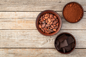 Sticker - Cocoa beans grain in bowl . Ingredient for preparating chocolate